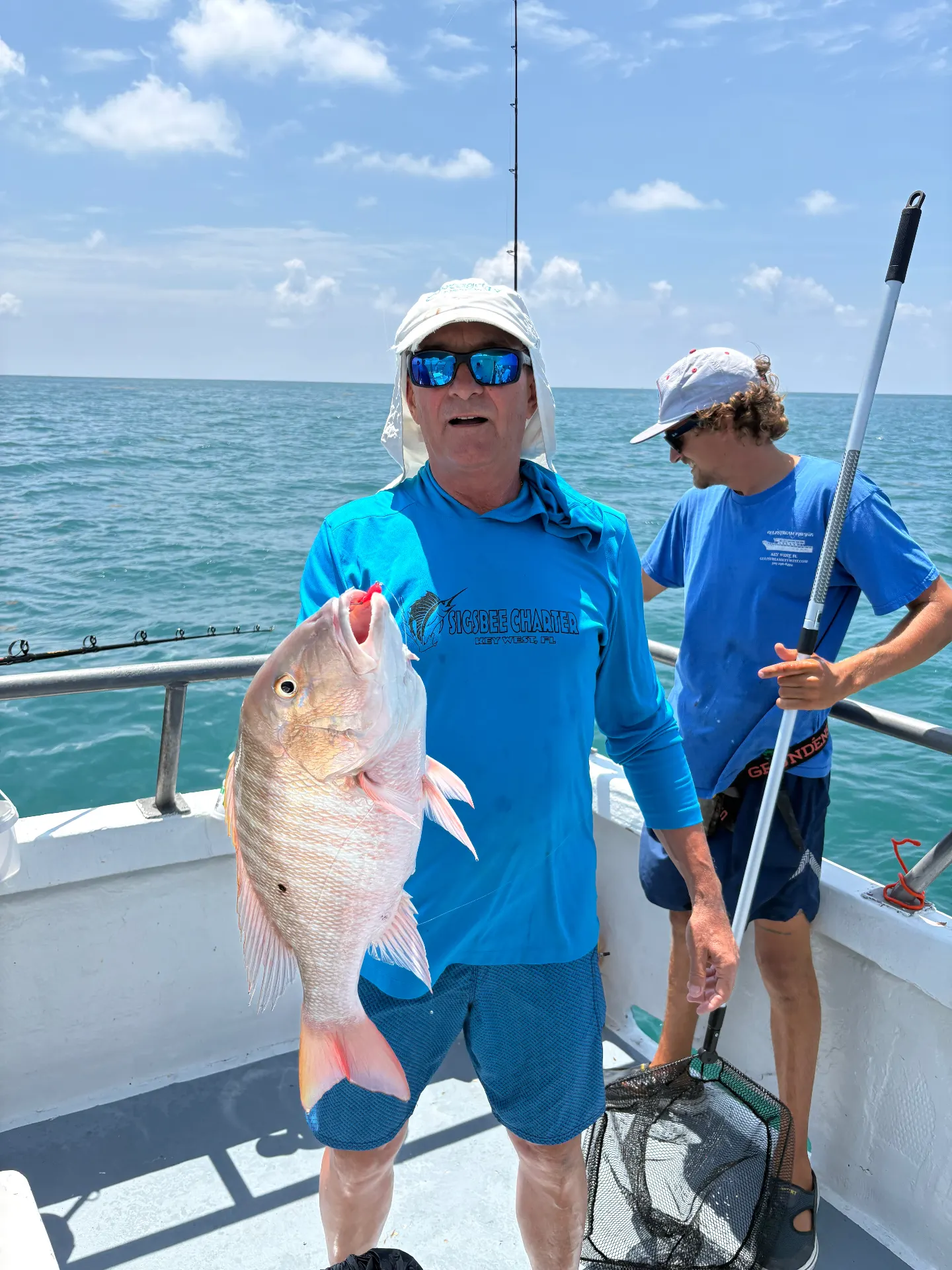 Angler holding a thick mutton snapper caught on the Gulfstream party boat off Key West, April 10, 2026.