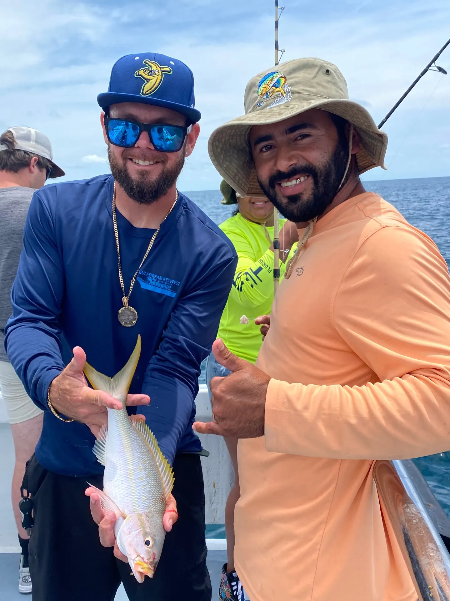 Happy fisherman with catch using Dash Pass