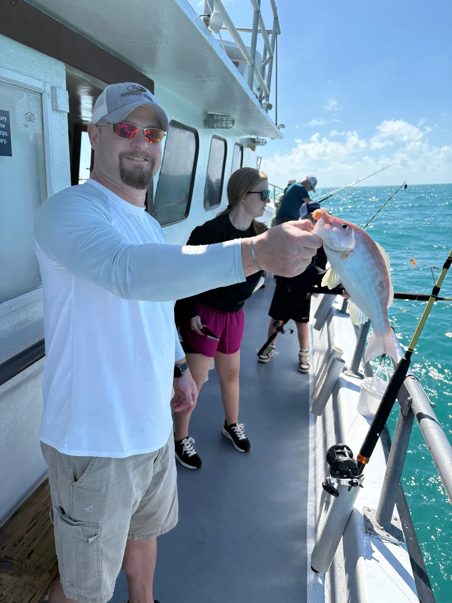 Angler holding a lane snapper caught on the Gulfstream party boat off Key West, January 2026.