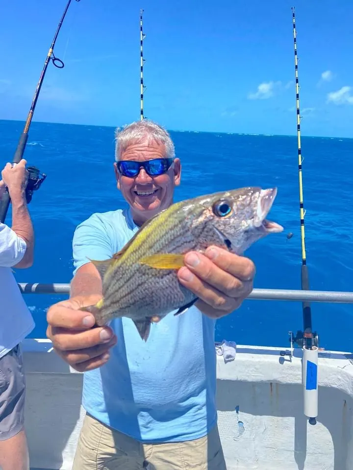 Happy angler with their catch