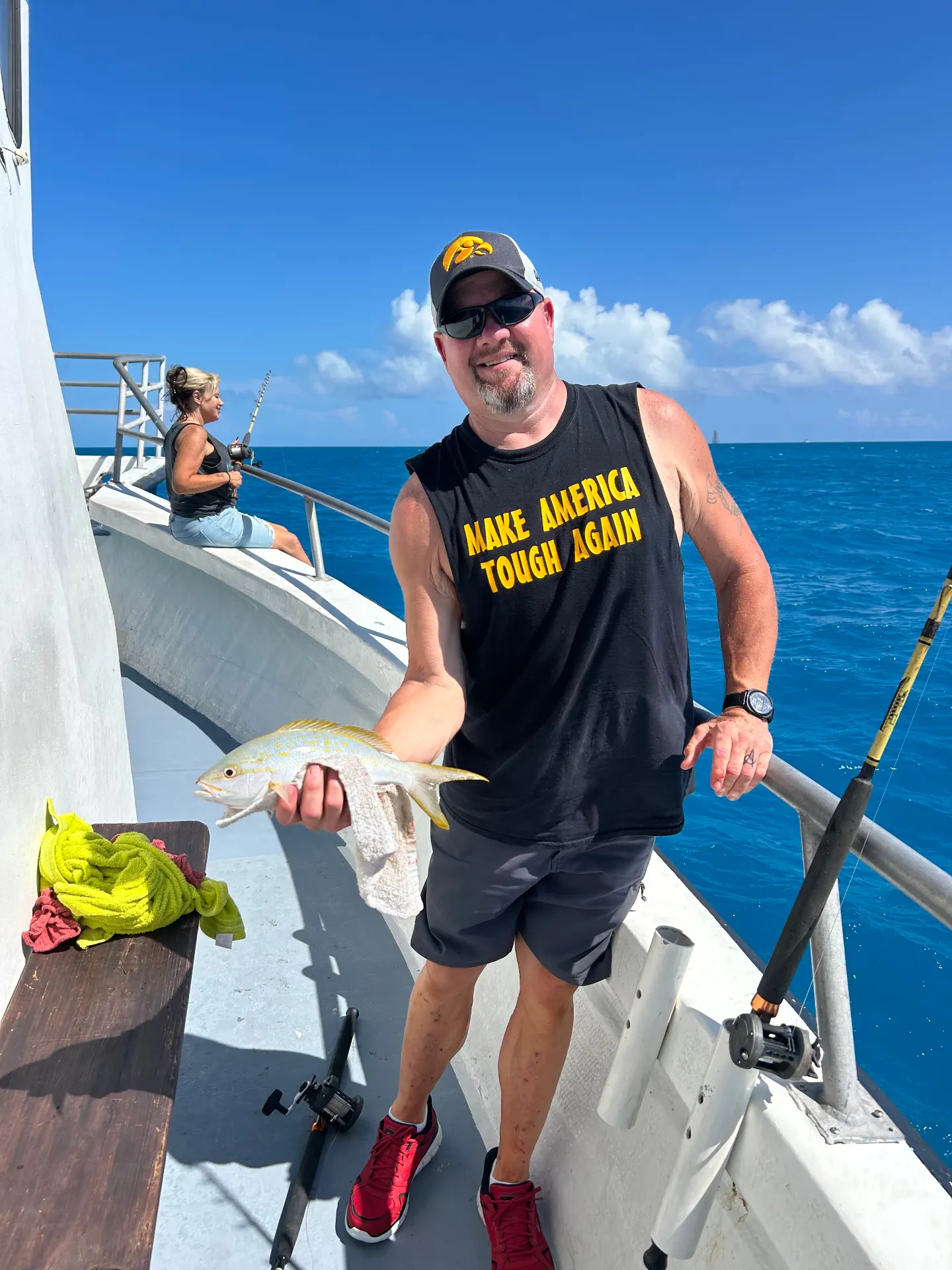 Yellowtail snapper catch with beautiful blue Key West ocean background